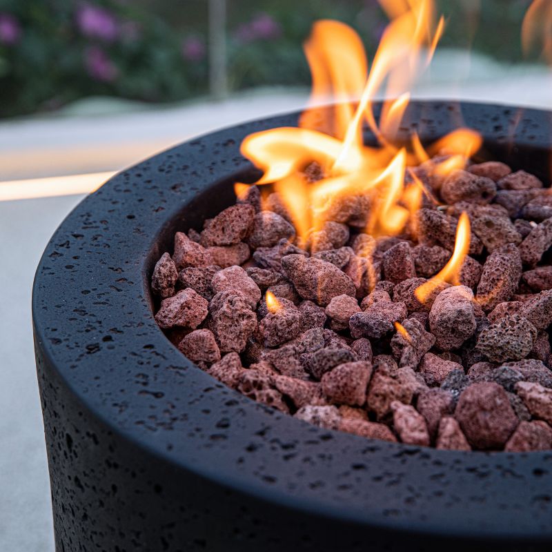 Modeno Lava Tube Fire Pit with flame close up