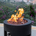 Modeno Lava Tube Fire Pit with flame Close up view